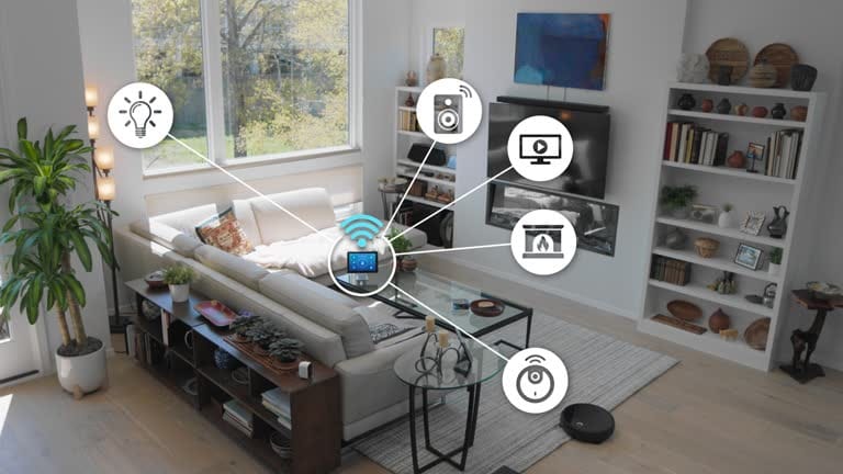 A digital tablet connects to multiple smart devices in a quiet living room of a smart home